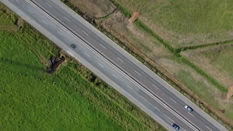 Aerial top down drone shot above cars driving on the street 4k. Stock Footage 157191738
