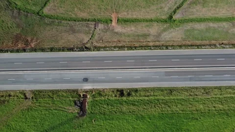 Aerial top down drone shot above cars driving on the street 4k. Stock Footage 157191763