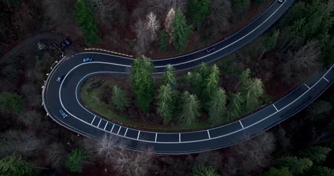 Aerial top down drone shot above the winding mountain road. Cars and trucks Video stock 201061015