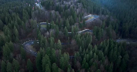 Aerial top down drone shot above the winding mountain road. Cars and trucks Video stock 201061668