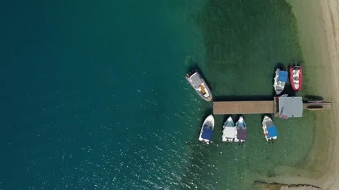 Aerial top down drone shot of boat rental facility in Lefkada, Greece. Stock Footage 245472308