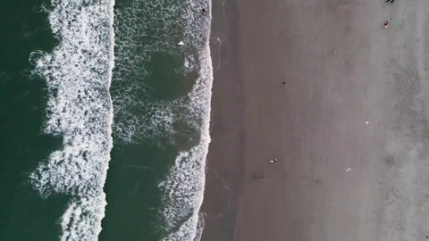 Aerial Top-Down Drone Shot of Waves Crashing on Beach – 4K Stock Footage 313907828