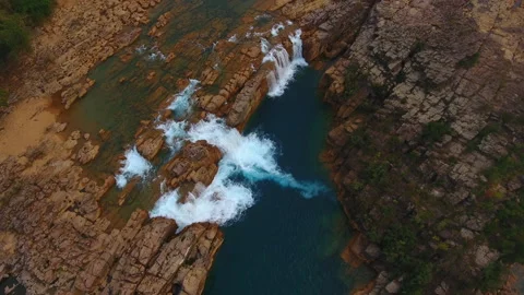 Aerial top down drone shot of Panimur Waterfall in Assam 4K Stock Footage 341785097