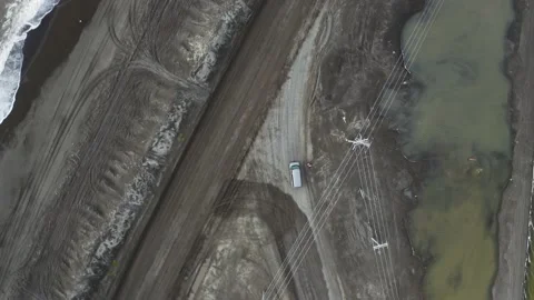 Aerial Top Down Drone of Van and Flooded Road with Arctic Ocean Barrow Alaska Stock Footage 239938571