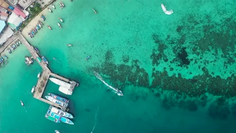 Aerial top-down drone view of colorful Thailand traditional long tail boats Stock Footage 223869494