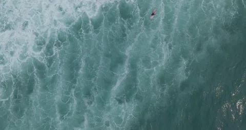 Aerial Top Down Drone view of Surfers at... | Stock Video | Pond5