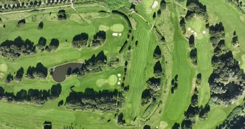 Aerial top down drone view of a golf course, leisure sports activities. Stock Footage 252189288