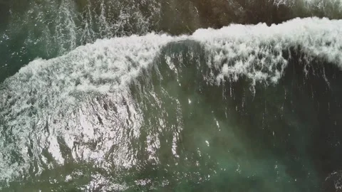 Aerial top down drone view of sea waves crashing Stock Footage 278795068
