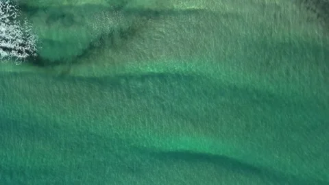 Aerial top down drone view of turquoise transparent sea water Video stock 278796124