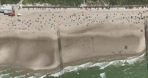 Aerial top down drone view on summer beach in Zeeland, The Netherlands. Stock Footage 287447754