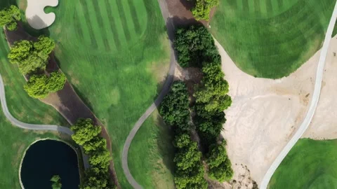 Aerial Top Down Drone View of Exclusive Green Golf Course with Sand Bunkers Stock-Footage 339901675