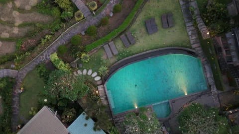 Aerial top-down drone view of a tropical swimming pool Stock Footage 345621611