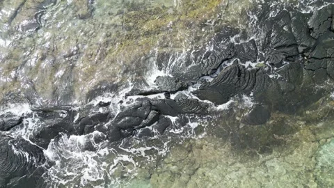 Aerial top-down drone view of waves in Hawaii 動画素材 347825766
