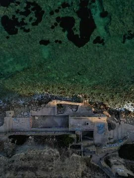 Aerial top down drone view of abandoned postmodern building in Spain Stock Photos