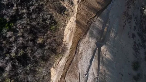 Aerial top down of empty dried up river bed on historic route 66 in Lupton .. 스톡 동영상 320739954