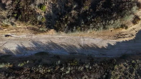 Aerial top down of empty dried up river bed on historic route 66 in Lupton .. Vidéo 320740363