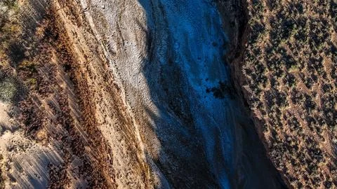 Aerial top down of empty dried up river bed on historic route 66 in Lupton .. Stock Photos