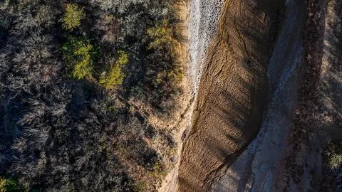 Aerial top down of empty dried up river bed on historic route 66 in Lupton .. Stock Photos