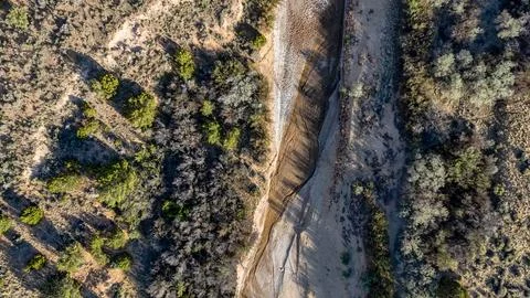 Aerial top down of empty dried up river bed on historic route 66 in Lupton .. Stock Photos