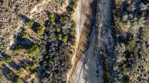Aerial top down of empty dried up river bed on historic route 66 in Lupton .. Stock Photos