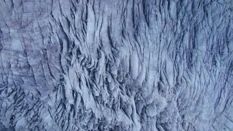 Aerial top down epic glacier grand frozen mass of ancient ice deep cracks Elbrus Video stock 153257540