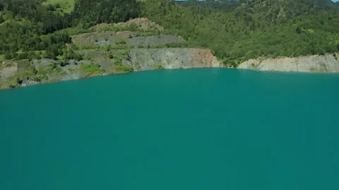 Aerial top down flight over amazing small lake of perfectly round shape. Stock Footage 169488677