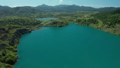 Aerial top down flight over amazing small lake of perfectly round shape. Stock Footage 169488705
