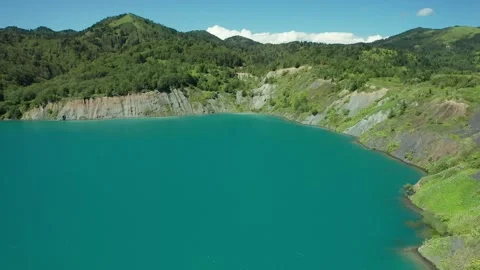 Aerial top down flight over amazing small lake of perfectly round shape. Stock Footage 169488869