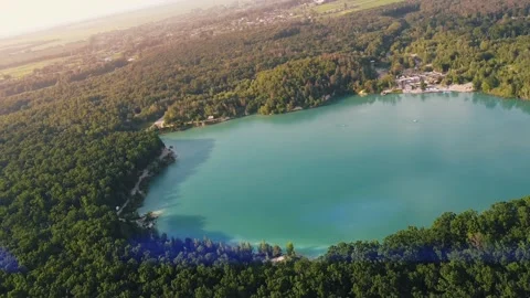 Aerial top down flight over amazing small lake of perfectly round shape. Stock Footage 204872781