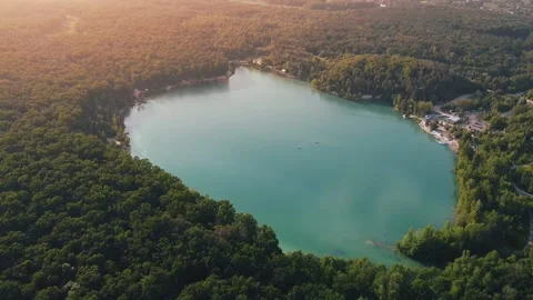 Aerial top down flight over amazing small lake of perfectly round shape. Stock Footage 204872884