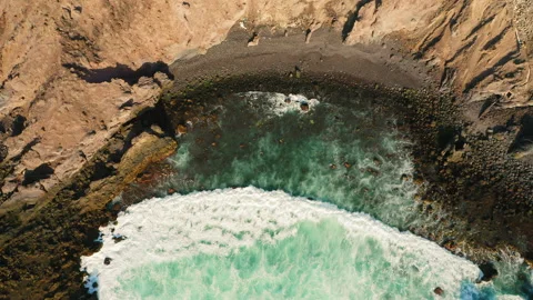 Aerial top down flight over clear wild rocky cliff, paradise island Tenerife Video stock 206075533