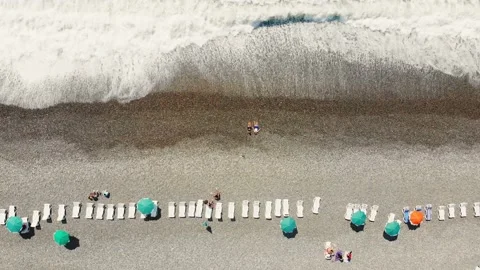 Aerial top down fly over tourist at Sarpi Beach in Batumi enjoying summer in  動画素材 157271179