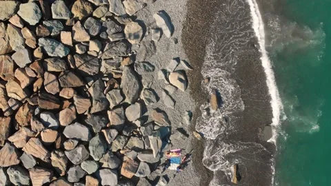 Aerial top down fly over tourist at in Batumi enjoy summer in hot sunny day Stock Footage 242454009