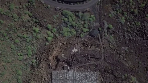Aerial top down footage camera flight above the landscape housing on Lanzarote Stock Footage 85018191