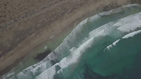 Aerial top down footage camera turn above the moving wave on the coast Stock Footage 85301634