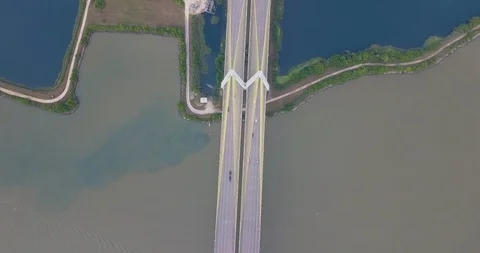 Aerial top down of the Fred Hartman bridge crossing over the Houston Ship Stock Footage 128534286