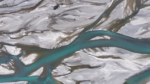Aerial top down of glacial braided river in New Zealand South Island wilderness Video stock 337788445