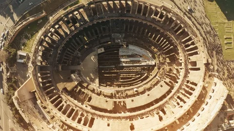 Aerial top down hyperlapse of crowded Colosseum or Coliseum amphitheatre in Rome Stock Footage 100777289