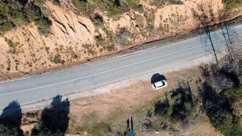 Aerial top down of Meteora cliff road rock formations winter day in Kalamba.. 動画素材 314618190