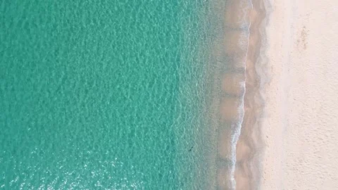 Aerial top down nature view of rocks and beach near the blue sea of Palamos.. 스톡 동영상 246294899