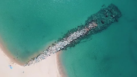 Aerial top down nature view of rocks in the blue sea of Palamos Costa Brava Vídeos de archivo 246294960