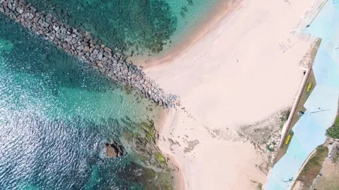 Aerial top down nature view of rocks and beach near the blue sea of Palamos.. 스톡 동영상 246295019