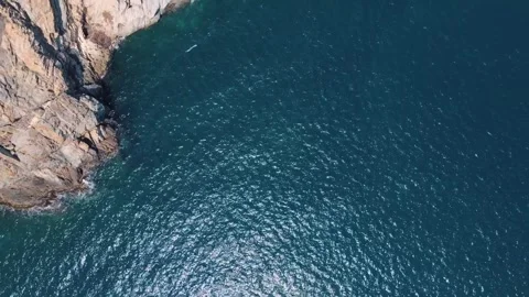 Aerial top down nature view of rocks in the blue Mediterranean Sea in Palam.. 스톡 동영상 246296448