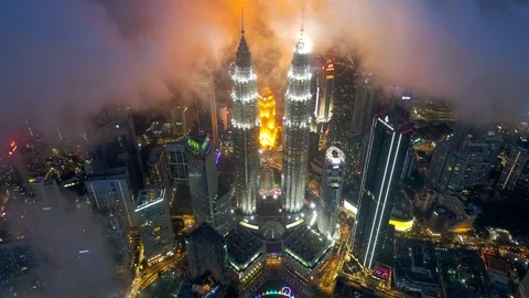 Aerial top down night view with low clouds at KLCC, Malaysia. Stock Footage 101579756