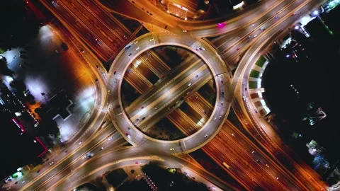 Aerial top down night view of a multilevel junction highway interchange 스톡 동영상 263658659