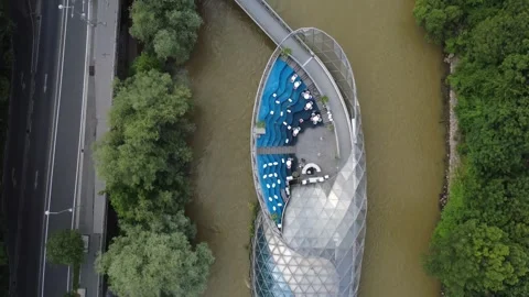 Aerial top down over the Murinsel island on the Mur, Graz Stock Footage 338294478