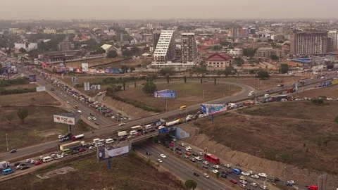 Aerial top down panorama of daytime junction traffic, Accra, Ghana Video stock 293236779