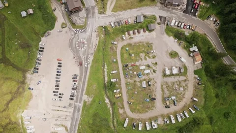 Aerial top down panorama vehicles and tents in official closed Campsite All.. Видео 332272058