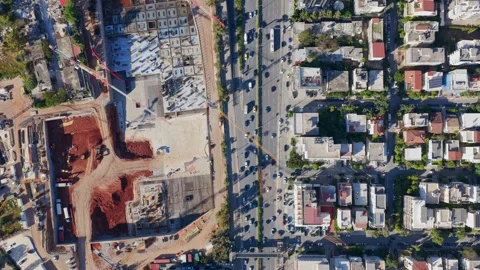 Aerial top-down perspective showing the foundational stages of a large construct Stock Footage 334470004