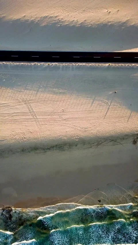 Aerial top-down perspective showing the mesmerizing contrast between the ocean Stock Footage 344839357